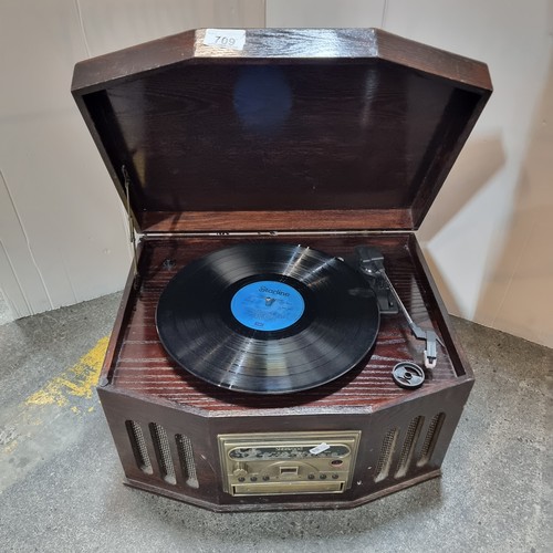 709 - A Sherwood brand record player/turntable and cassette deck. In a rich, dark wood case. Stylus includ... 