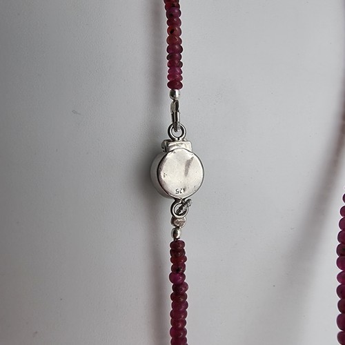 657 - A fabulous Cabochon Ruby graduated gemstone necklace, of 95 carats and set with a sterling silver cl... 