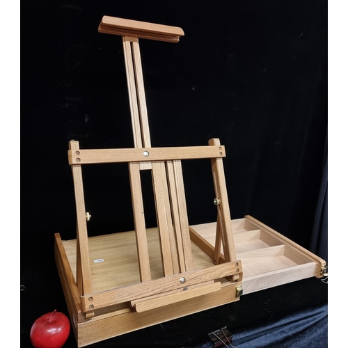 126 - A great example of a portable field easel. Crafted entirely of wood with plenty of storage space and... 