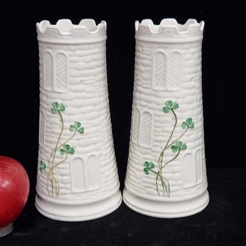 156 - Two lovely vintage Belleek porcelain vases in the form of medieval towers. With hand painted detail.... 