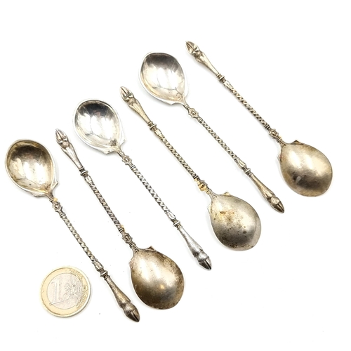 20 - A collection of six Continental silver antique coffee spoons. Hallmarked 830. Spoons are set set wit... 