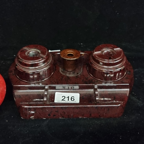 216 - A 1920s bakelite desk organiser, inkwell set with an additional ink container and a compartment for ... 