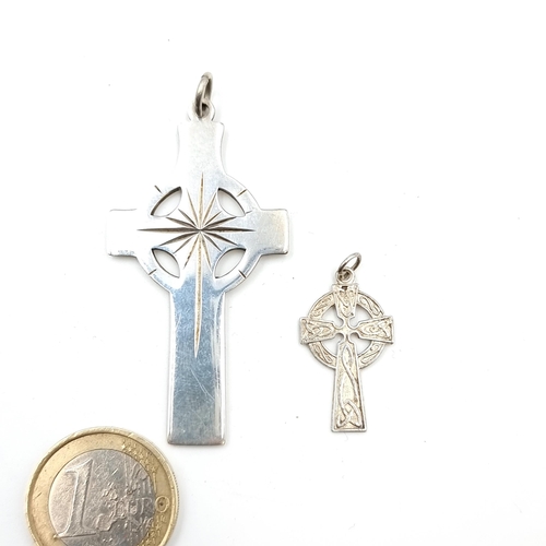 26 - Two sterling silver high quality Celtic crosses, each hallmarked. Nice, clean examples.