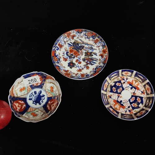 260 - A selection of three porcelain plates, including two Japanese made examples including an Imari bowl ... 