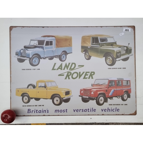 283 - A metal wall sign depicting various Land Rovers.