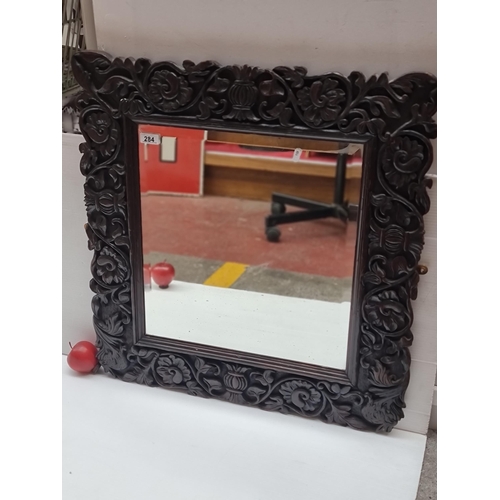 284 - Star Lot : A gorgeous, very heavy late 19th century beveled wall mirror with beautiful hand carved B... 