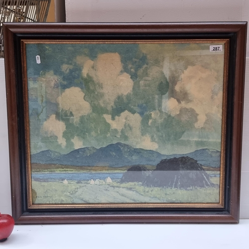 287 - A large vintage print of a painting by Paul Henry, housed in a vintage frame.