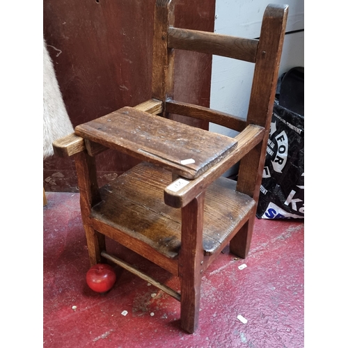 297 - An 18th century delightful children's dining chair with removable tray to top for eating. With lovel... 