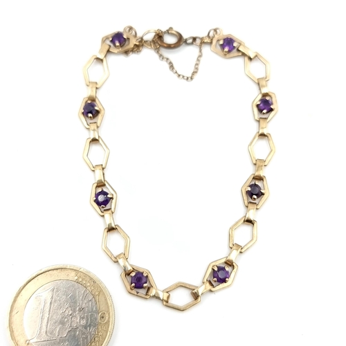 36 - Star Lot : An exquisite 9 carat Gold eight stone bracelet, set with beautifully hued Amethyst stones... 
