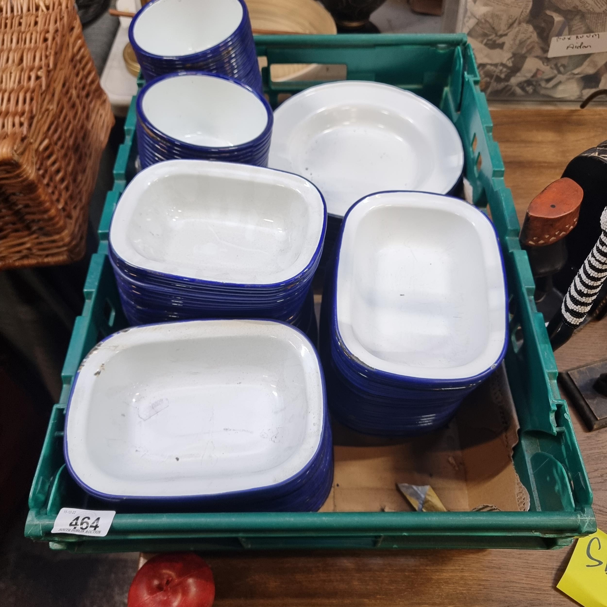 A huge selection of enamelled dinnerware. Striking examples in white