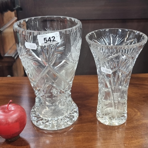 542 - Two very heavy cut crystal vases in a trumpet shape. Including a wheel cut Bohemian example.