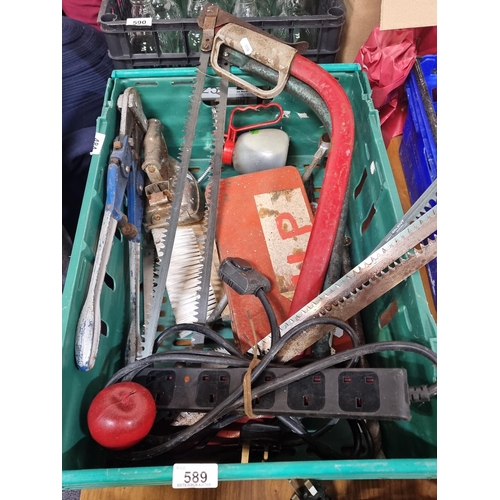 589 - A crate of hardware and DIY tools. Including two hack saws with extra blades, an extension cord, bol... 