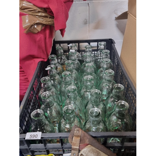 590 - A set of twenty-four heavy glass bottles, branded Roe & Coe. All very clean and in good condition.