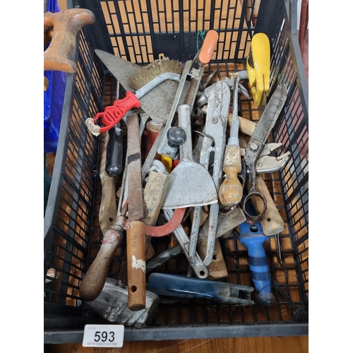 593 - A selection of hardware and DIY tools including a pair of secateurs, a hacksaw, a bricklayer's trowe... 