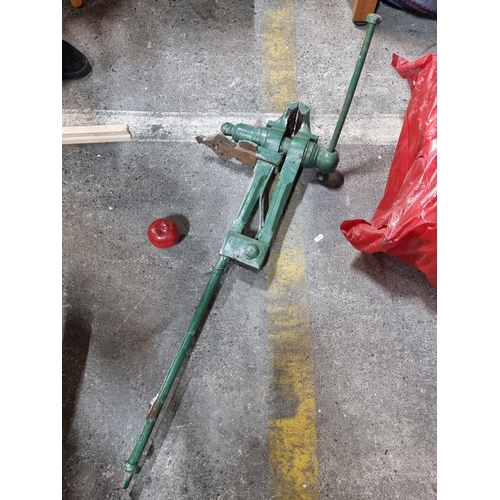 594 - A very heavy, cast iron floor vice with long rod for securing in the ground. Very heavy duty object.... 