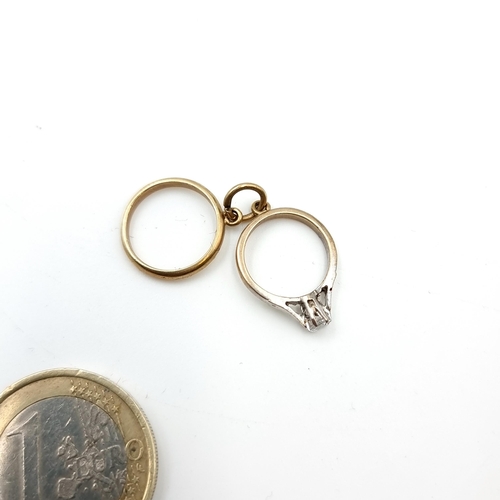 8 - An unusual 9 carat Gold antique double band ring pendant charm. Hallmarked and featuring a Gem set c... 