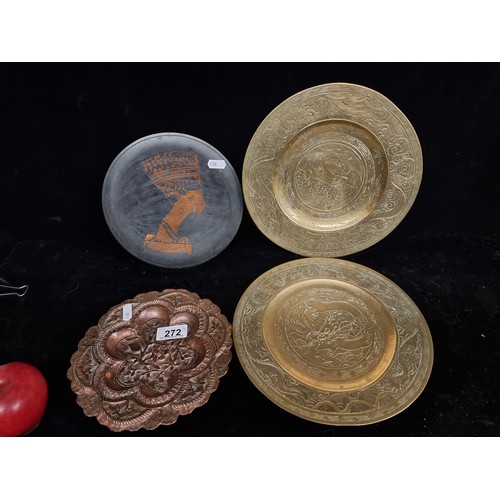 272 - A selection of four, vintage plates. Including two Indian brass examples, with a hammered copper dis... 