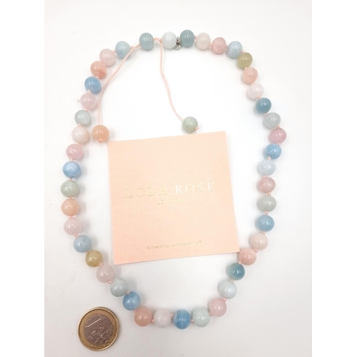 854 - A beautiful precious gemstone necklace by Lola Rose London consisting of morganite rounded beads in ... 