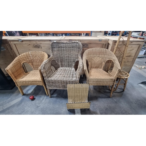 887 - A selection of five pieces of wicker and rattan furniture. Including a high backed chair and two cha... 