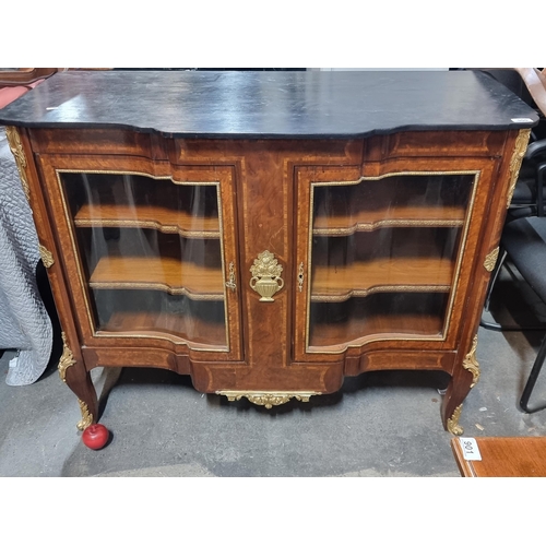 900 - Star lot : A beautiful ornate French style sideboard with three interior shelves and astro gated doo... 
