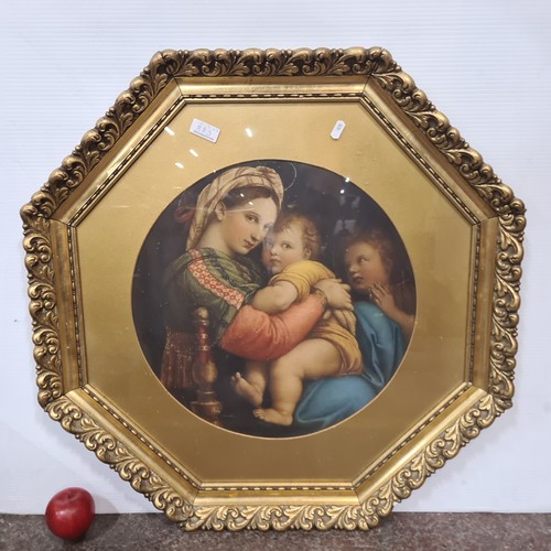 883 - A large high quality print depicting Raffaello's 'Madonna and Child' painting. Housed in a highly or... 