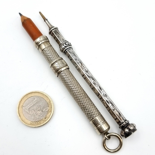 48 - Two very attractive sterling silver pencil items, including a set inlayed gem stone mount example an... 