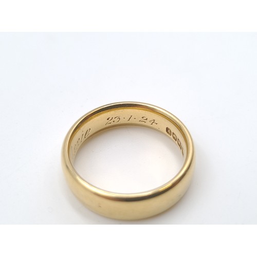 4 - Star Lot: A handsome heavy 18 carat Gold wide band ring, a clean example with hallmarks stamped to b... 