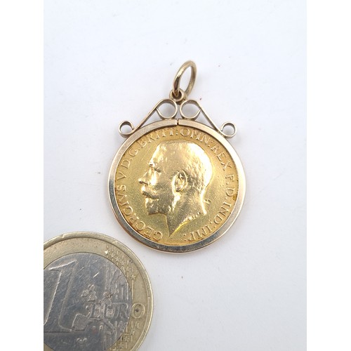31 - A George 5th full Sovereign, With a 9ct gold  pendent mount. Circa 1911. Nice high grade example.