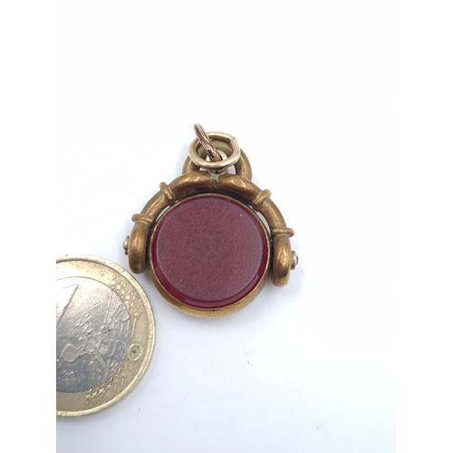 35 - An attractive antique 19th century Blood stone and Carnelian fob articulated fidget pendant.