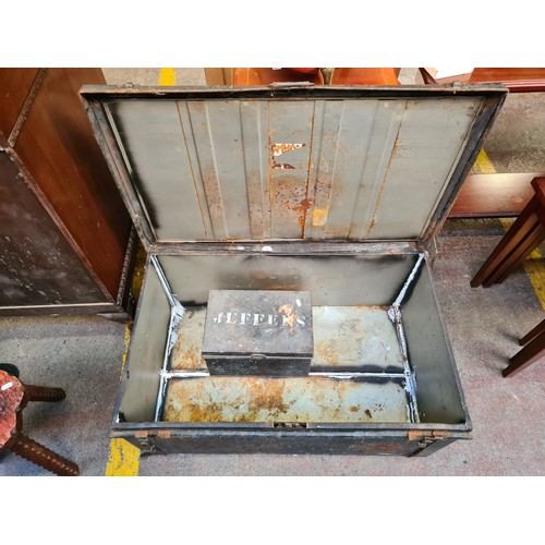 473 - A large, vintage metal military storage chest. With a second smaller example on interior. The latter... 