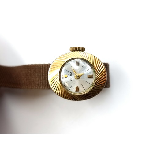 454 - A ladies vintage 9ct gold wrist watch by designer 