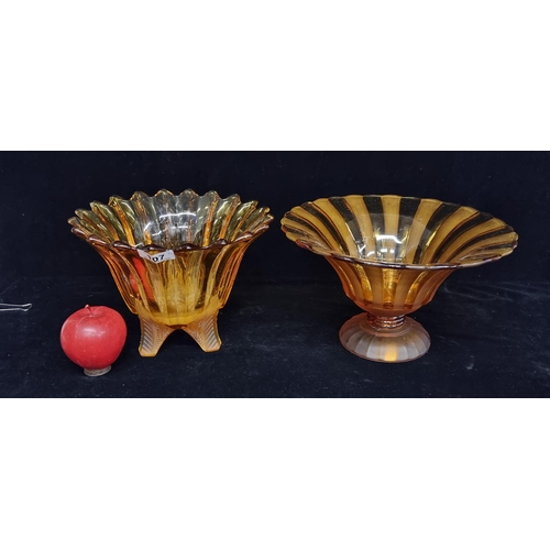 107 - Two fabulous vintage amber glass bowls. Including one large pedestal fruit bowl with a flared rim an... 