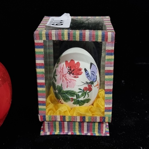 119 - A  beautiful vintage Chinese hand painted eggs, featuring delicate floral and butterfly motifs. Hous... 