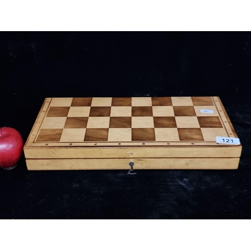 121 - A lovely portable wooden chess board with pieces for both chess and checkers held inside.