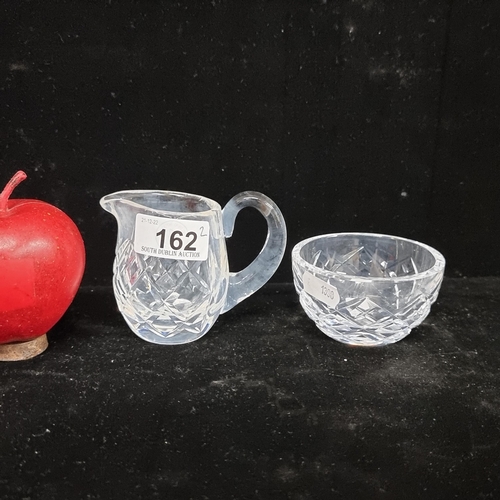 162 - A vintage Waterford crystal sugar bowl and cream jug in very good condition.