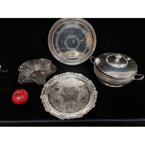 179 - Four silver plated items including a decorative pierced bowl, two trays and a terrine with lid.