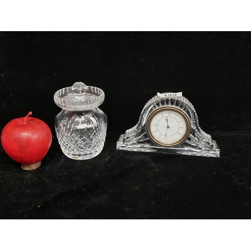 199 - A Waterford Crystal mantle clock and a cut crystal lidded jam jar, both in good condition.