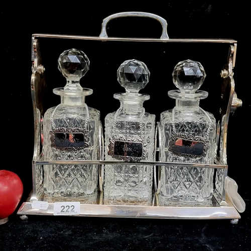 222 - A fabulous Victorian tantalus in The Benjamin patent. With a full suite of three crystal decanters. ... 