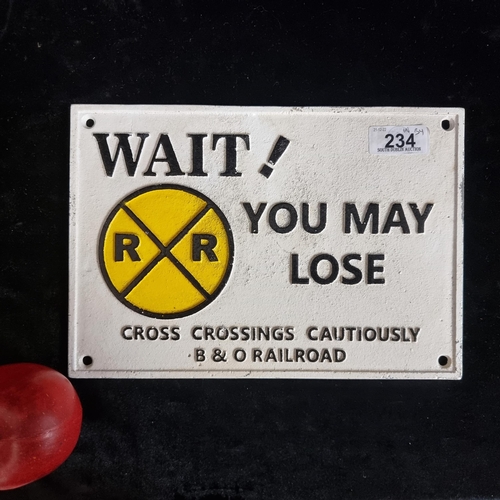 234 - A heavy, cast metal wall sign. Reading ''Wait! You May Lose - Cross Crossings Cautiously B & O Railr... 