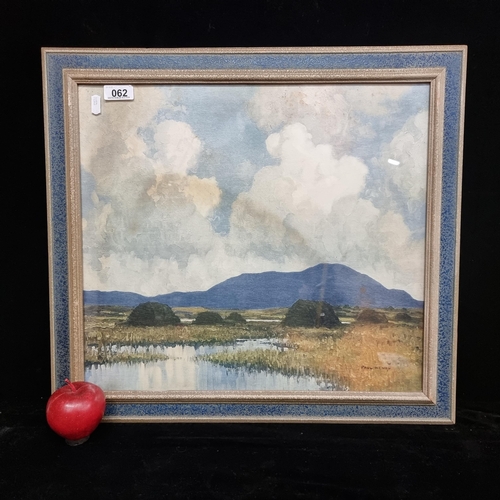 62 - A vintage print of a painting by Paul Henry, housed in a charming mottled blue frame.