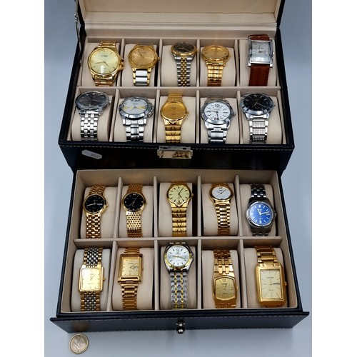 33 - A super collection of 20 wristwatches, all with original straps. Presented in a very fine new black ... 