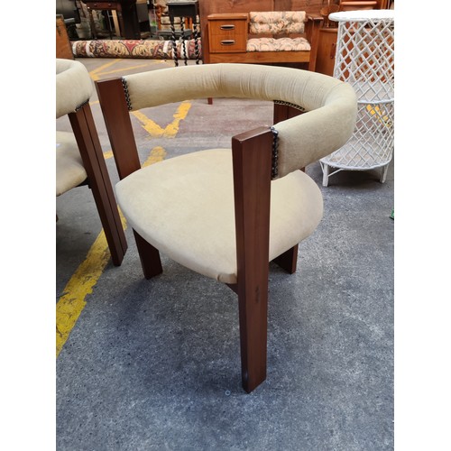 287 - Star Lot : A fabulous Mid Century Modern, dining suite of six carved teak wood tub chairs with a mat... 