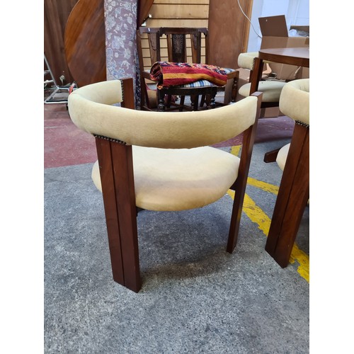 287 - Star Lot : A fabulous Mid Century Modern, dining suite of six carved teak wood tub chairs with a mat... 