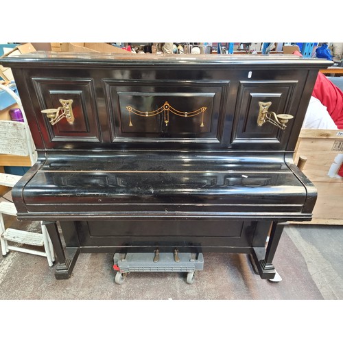 313 - Star Lot A fantastic black ebonised antique Pigott & Co. Dublin Upright Iron piano. With a beautiful... 