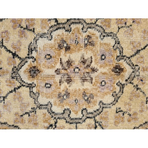 370 - Star lot : A genuine large vintage wool, hand knotted hand finished  Turkish rug. In shades of brown... 