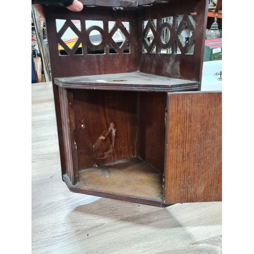 242 - A vintage corner, smoker's cabinet. For use with tobacco pipes. A handsome example with ample storag... 