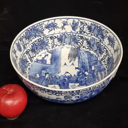 223 - Star lot : A delightful large antique kraak ware blue and white Chinese porcelain bowl with a court ... 