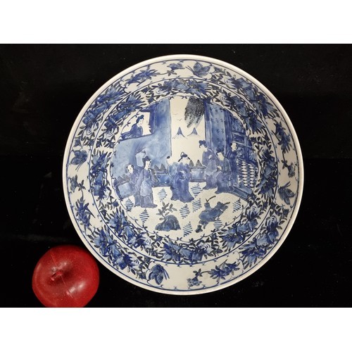 223 - Star lot : A delightful large antique kraak ware blue and white Chinese porcelain bowl with a court ... 