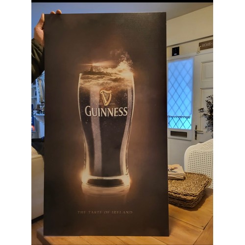 637 - A really nice large Guinness advertising panel, featuring a Lighthouse in the crashing waves of the ... 