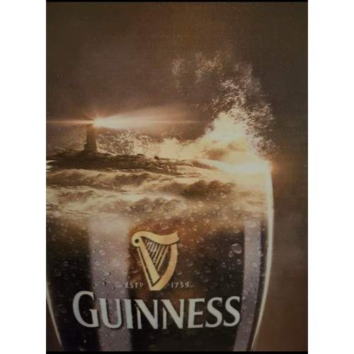 637 - A really nice large Guinness advertising panel, featuring a Lighthouse in the crashing waves of the ... 